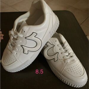 White Sneakers with Black Logo